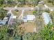 Overhead view of the home and adjacent properties showcasing neighborhood and position on the street at 827 Louise St, Brandon, FL 33511