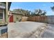 Backyard patio with a privacy fence, perfect for entertaining at 827 Louise St, Brandon, FL 33511