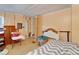 Bedroom featuring a white headboard, bed, and open closet at 827 Louise St, Brandon, FL 33511