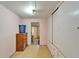 Bedroom features a closet with sliding doors and a dresser with gold finish handles at 827 Louise St, Brandon, FL 33511