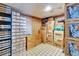 Organized storage room with shelves, boxes, and durable flooring at 827 Louise St, Brandon, FL 33511