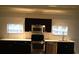 Updated kitchen with quartz countertops, stainless steel appliances, and modern black cabinetry at 832 S Parsons Ave, Brandon, FL 33511