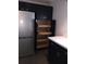 Kitchen features a modern stainless steel refrigerator and pull out shelving at 832 S Parsons Ave, Brandon, FL 33511