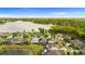Picturesque aerial view of the property, near a large lake, highlighting its desirable location at 1106 Tracey Ann Loop, Seffner, FL 33584