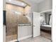Beautiful bathroom featuring walk-in shower with stone floor and a window at 1106 Tracey Ann Loop, Seffner, FL 33584