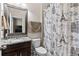 Full bathroom featuring a vanity with granite countertop and shower with Paris themed curtain at 1106 Tracey Ann Loop, Seffner, FL 33584