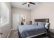 Cozy bedroom with neutral color palette and a view to the en-suite bathroom at 1106 Tracey Ann Loop, Seffner, FL 33584