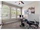 Bright office space with ample natural light from three windows and a functional workspace at 1106 Tracey Ann Loop, Seffner, FL 33584