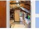 Unfinished attic space offers ample storage with exposed beams and wood floors at 115 21St Ne Ave, St Petersburg, FL 33704