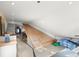 Spacious attic conversion area with gray carpet and modern lighting at 115 21St Ne Ave, St Petersburg, FL 33704