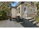 Backyard patio and steps leading to entrance with barbecue grill and wrought iron railing at 115 21St Ne Ave, St Petersburg, FL 33704