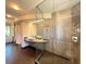 Modern bathroom featuring a frameless glass shower, tile accents, and unique vessel sink at 115 21St Ne Ave, St Petersburg, FL 33704