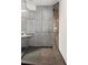 Shower with tile surround and custom fixtures at 115 21St Ne Ave, St Petersburg, FL 33704