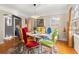 Stylish dining room featuring colorful chairs and ample space for entertaining guests at 115 21St Ne Ave, St Petersburg, FL 33704