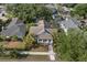 Charming home with lush landscaping, a well-manicured lawn, and a welcoming front entrance at 115 21St Ne Ave, St Petersburg, FL 33704
