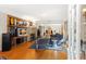 Inviting living room features a brick fireplace, hardwood floors, and classic built-in shelving at 115 21St Ne Ave, St Petersburg, FL 33704