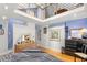 Comfortable main bedroom with a loft area above, lots of light, and warm wood flooring at 115 21St Ne Ave, St Petersburg, FL 33704