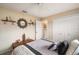 Bedroom showcasing a bed, closet, shelving, and decorative mirror, providing a stylish retreat at 121 Colonial Sw St, Port Charlotte, FL 33952