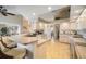 Spacious kitchen featuring breakfast bar, lots of cabinet space, and tiled flooring at 121 Colonial Sw St, Port Charlotte, FL 33952