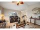 Inviting living room with comfortable seating and stylish decor accents throughout the space at 121 Colonial Sw St, Port Charlotte, FL 33952