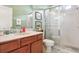 Bathroom with a glass shower, and updated vanity with sink at 1430 Beaconsfield Dr, Wesley Chapel, FL 33543