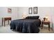Bedroom with neutral walls and minimalist decor at 1430 Beaconsfield Dr, Wesley Chapel, FL 33543