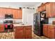 Kitchen with a spacious island, modern appliances, and cabinets at 1430 Beaconsfield Dr, Wesley Chapel, FL 33543