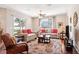 Living room offers natural light and comfortable seating at 1430 Beaconsfield Dr, Wesley Chapel, FL 33543