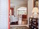 Open-concept living area and kitchen viewed from the doorway, showcasing a modern design at 1430 Beaconsfield Dr, Wesley Chapel, FL 33543