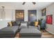 This is a comfy game room with stylish decor, sofa and game chair at 1547 Golden Glow Dr, Ruskin, FL 33570