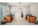 Cozy living area with two wooden dog kennels, offering a comfortable space for pets at 1547 Golden Glow Dr, Ruskin, FL 33570