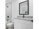 Modern bathroom with granite vanity top, tub-shower combo and updated fixtures at 1721 Shevlin St, North Port, FL 34286