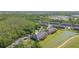 Overhead image displays the community with its trees, ponds, and golf course at 18236 Paradise Point Dr, Tampa, FL 33647