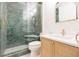 Elegant bathroom features tiled shower with glass doors and stylish vanity at 18236 Paradise Point Dr, Tampa, FL 33647