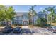 Charming two-story condo with well-manicured landscaping, ample parking, and a welcoming facade at 18236 Paradise Point Dr, Tampa, FL 33647