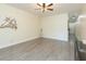 Living room featuring modern floors, ceiling fan, and stylish decor at 18236 Paradise Point Dr, Tampa, FL 33647