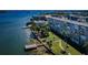 High-rise waterfront condos offering private boardwalks and a beautiful bay view with mature landscaping at 1847 Shore S Dr # 507, South Pasadena, FL 33707