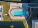 Overhead shot of community pool with lounge chairs and manicured landscaping at 1847 Shore S Dr # 507, South Pasadena, FL 33707
