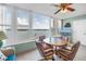 Bonus room featuring tile floors, fan and large windows with bay views at 1847 Shore S Dr # 507, South Pasadena, FL 33707