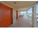 Hallway with elevator access and a bench seating area overlooking the waterfront view at 1847 Shore S Dr # 507, South Pasadena, FL 33707