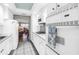 Functional kitchen space with white appliances, gas cooktop, and ample counter space at 1847 Shore S Dr # 507, South Pasadena, FL 33707