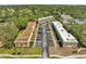 Birds eye view of multiple condo buildings and parking lots at 2005 Greenbriar Blvd # 7, Clearwater, FL 33763