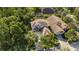 A high-angle view highlights this property's new roof, manicured lawn, and proximity to sidewalks at 20403 Walnut Grove Ln, Tampa, FL 33647