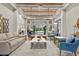 The Grand Hampton clubhouse interior boasts elegant furnishings and a welcoming ambiance for residents and guests alike at 20403 Walnut Grove Ln, Tampa, FL 33647