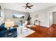 Inviting living room with hardwood floors, natural light, and stylish decor at 20403 Walnut Grove Ln, Tampa, FL 33647