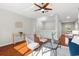 Upstairs living room with hardwood floors and comfortable seating at 20403 Walnut Grove Ln, Tampa, FL 33647