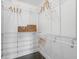 This walk-in closet has built-in shelving and hanging space to organize and store items at 2410 W North A St # 2, Tampa, FL 33609