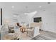 Stylish living room showcases modern décor, hardwood floors, contemporary lighting, and neutral colors at 2410 W North A St # 2, Tampa, FL 33609