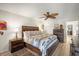 Comfortable bedroom featuring a wooden bed frame, ceiling fan, and modern decor at 2960 59Th S St # 615, Gulfport, FL 33707