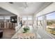 Bright dining room with a view and stylish wooden table with plenty of seating at 2960 59Th S St # 615, Gulfport, FL 33707